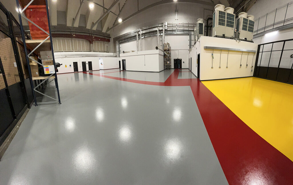 Factory flooring installation in Greenwich with epoxy coating