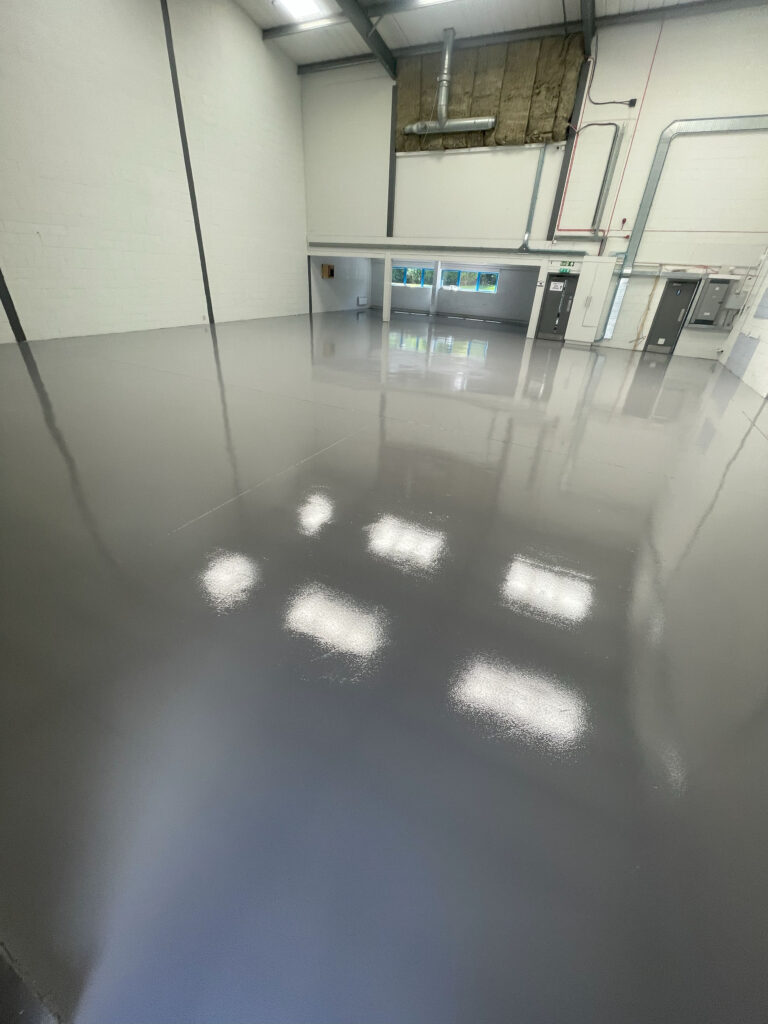 Warehouse flooring installation in Greenwich with professional finish